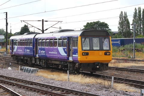 Northern class 142 "Pacer" no. 142057 approaching Doncaster from the south on 11th July 2015